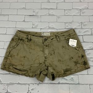 Free People Camo Distressed shorts. New NWT. Green brown. Button zip. Pockets 10